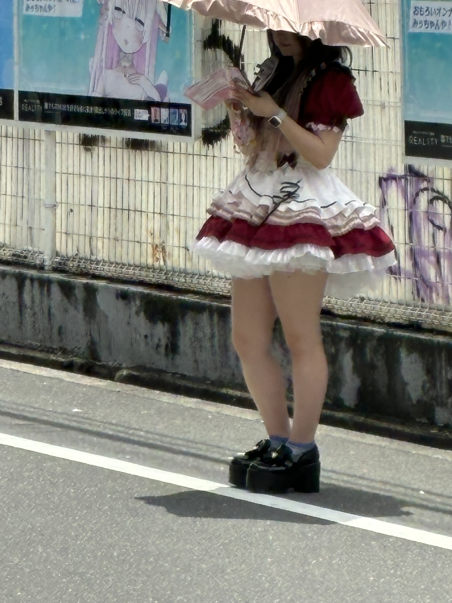 Maid cafe signboard in Osaka Nipponbashi