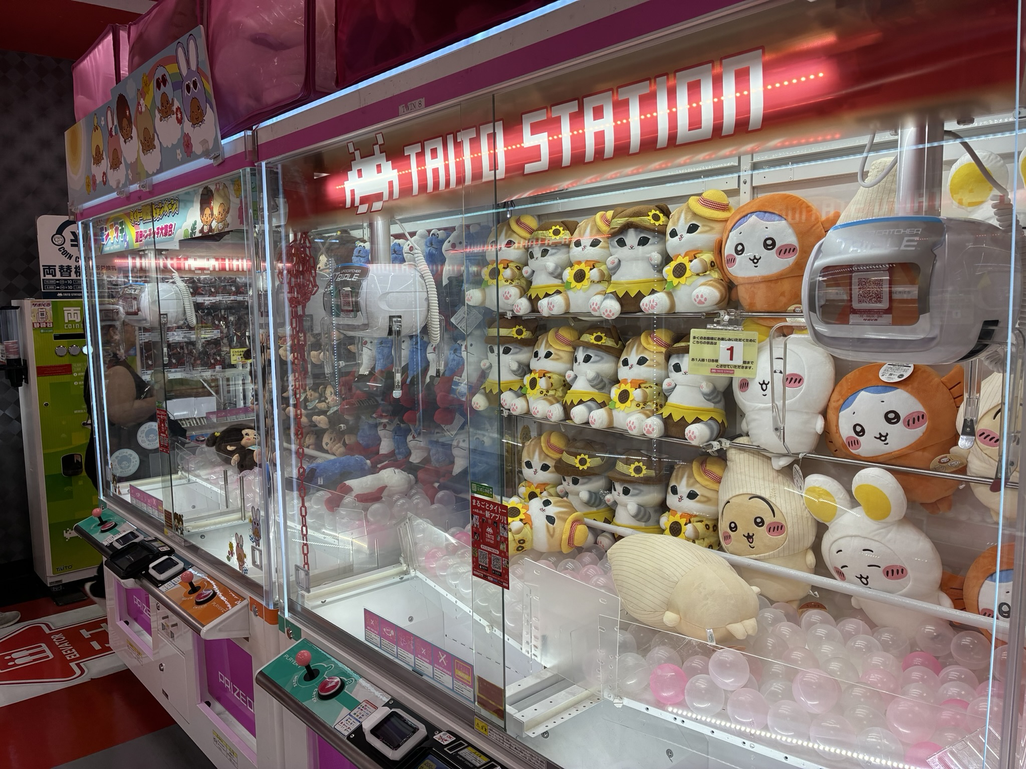Plush characters in a crane game machine in Japan