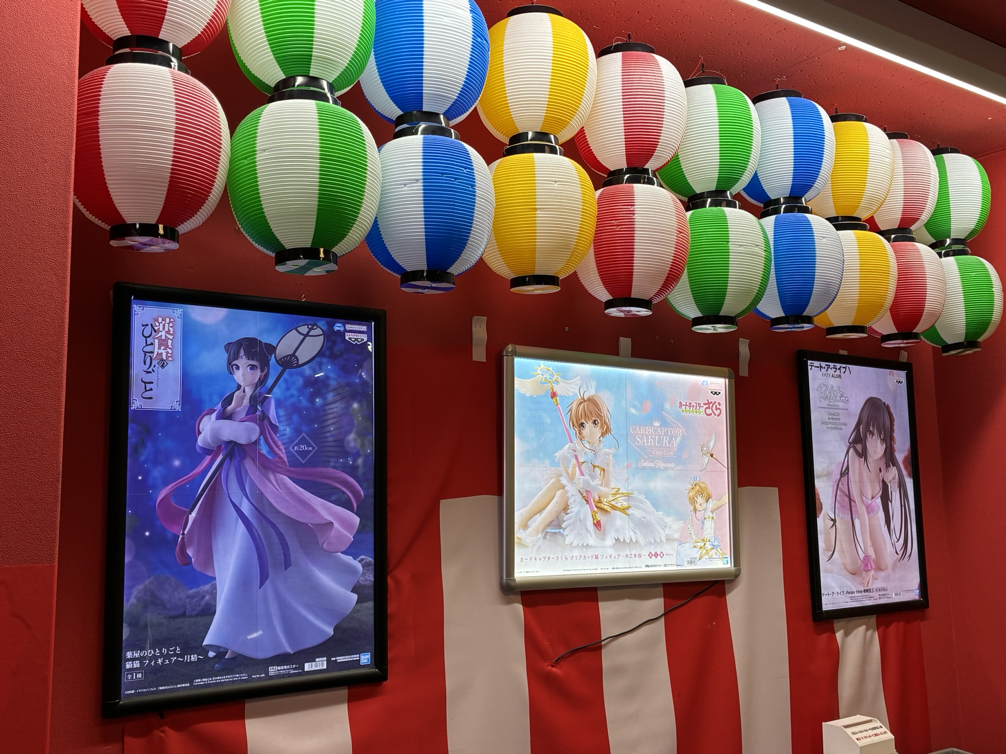 Colorful Japanese entertainment display with anime-style visuals